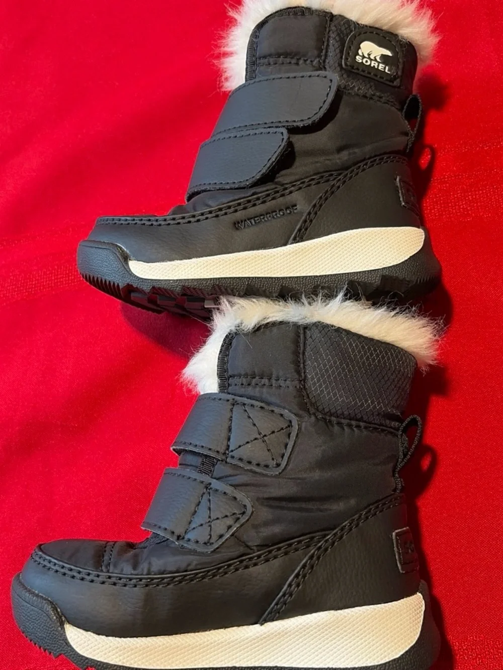Sorel Black Kids Snow Boots with White Faux Fur Cuff